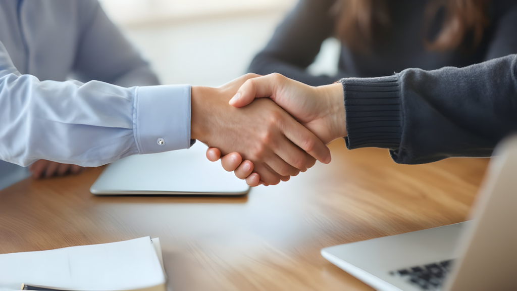 Business handshake at an exhibition